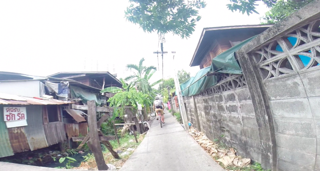 A home on stilts to the left. 