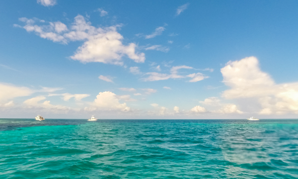 The Blue Hole as we approached. The boats on the left and right are on opposite sides of the hole. 