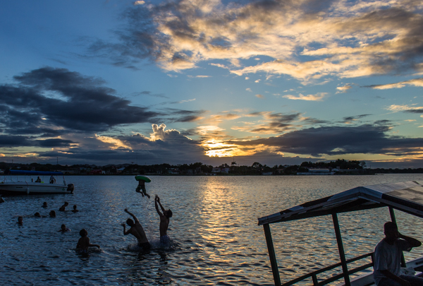 I somehow managed to catch a shot of some locals throwing a little boy into the air on Lago Petén Itzá just as the sun was setting. 