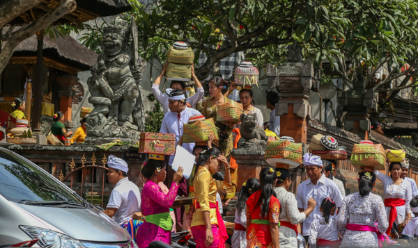 Locals heading inside the temple on Galungan. 