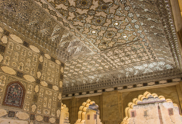 The mirrored glass and silver ceiling in the princesses' rooms. 